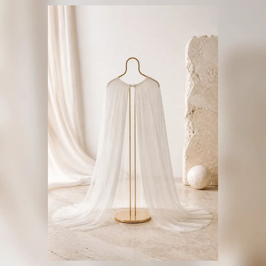 Anais Sheer Bridal Cape — close craftsmanship view showing construction and finish