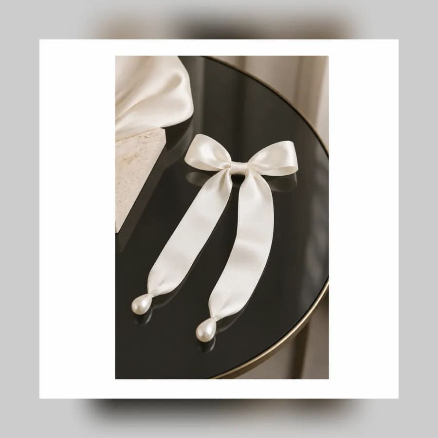 Vivienne Silk Hair Ribbon — material detail showing texture, scale, and tonal character